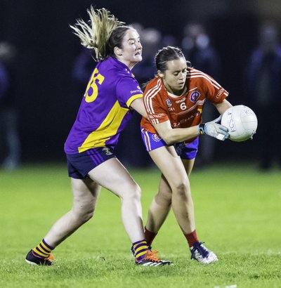 Éabha Rutledge (Kilmacud Crokes) & Kate Fitzgibbon (Clontarf) in action last season. The two clubs meet this Wed April 2nd in the opening round of the Go Ahead Ireland Division 1  league. Credit Maurice Grehan. Image