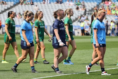 Carla Rowe (Clann Mhuire) leads the Dubs out versus Meath in the 2024 TG4 Leinster Final at Croke Park. Credit Maurice Grehan. Image